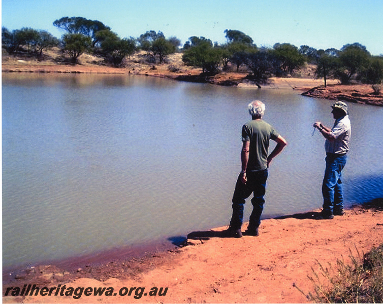 P20543
Sightseers at Wuraga railway dam, 80 kms east of Mullewa, NR line, view from damside
