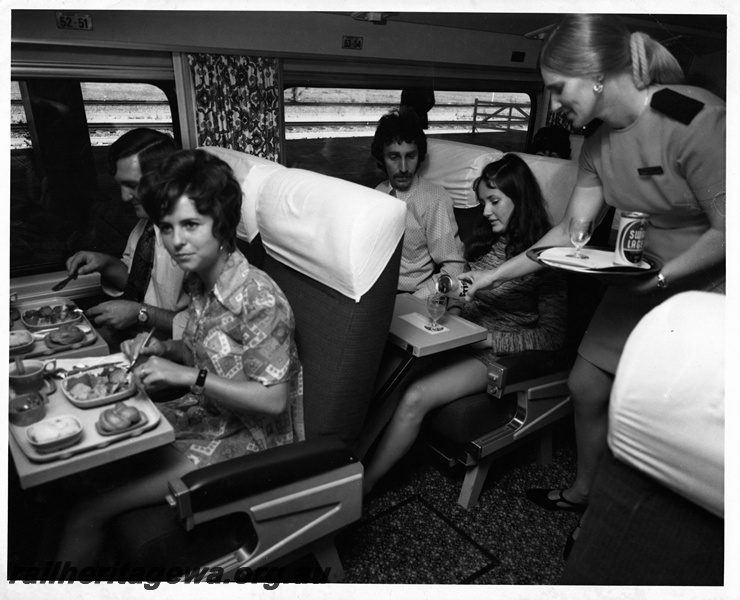 P20603
Stewardess serving passengers aboard the Prospector, publicity photo

