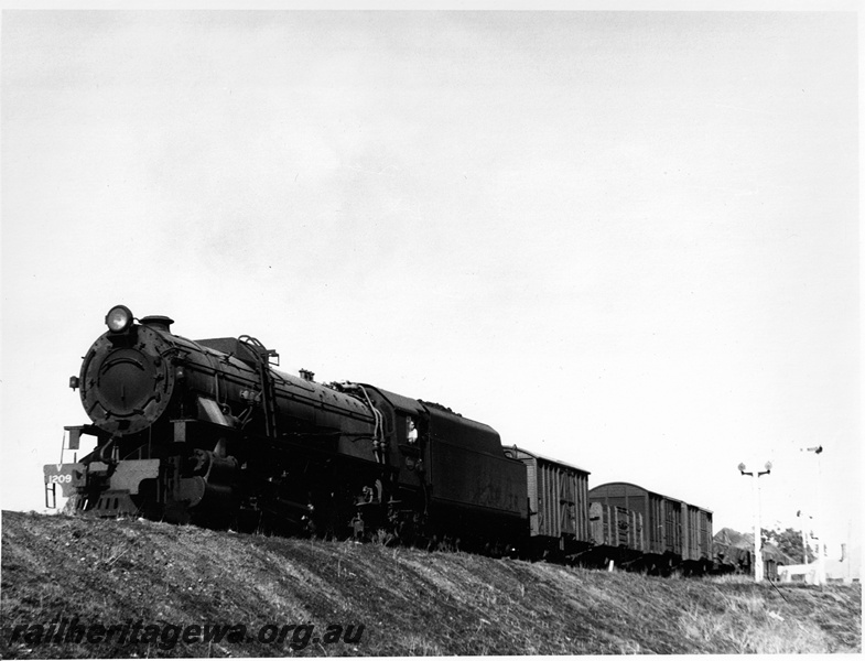 P20613
V Class 1209 on goods train, location unknown
