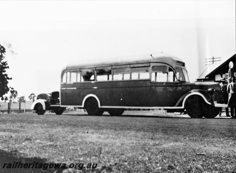 P20690
Gas producer bus, petrol pump, bystanders, rural setting, side and front view, c1941
