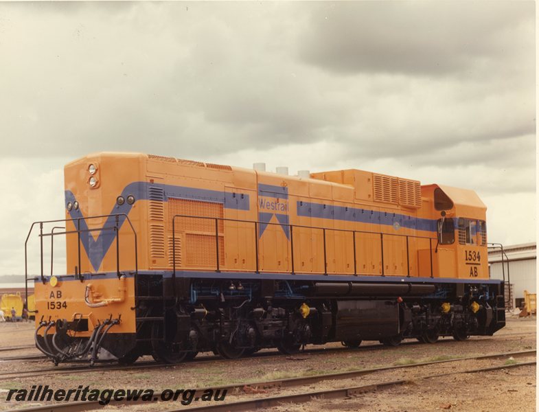 P20699
AB class 1534, in orange and blue livery without white stripe, Midland Workshops, ER line, side and end view, long end towards camera
