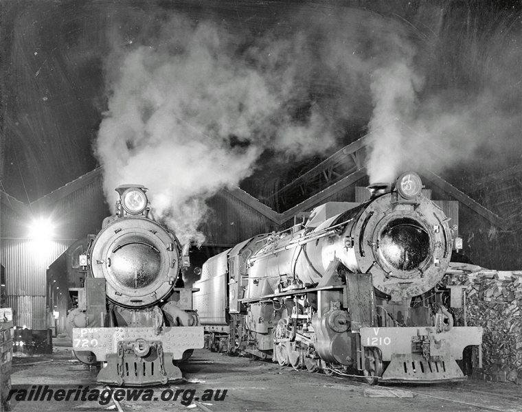 P20798
PMR class 720 and V class 1210 at East Perth loco depot.  Night photo, light up wood pile to right of locomotive. 

