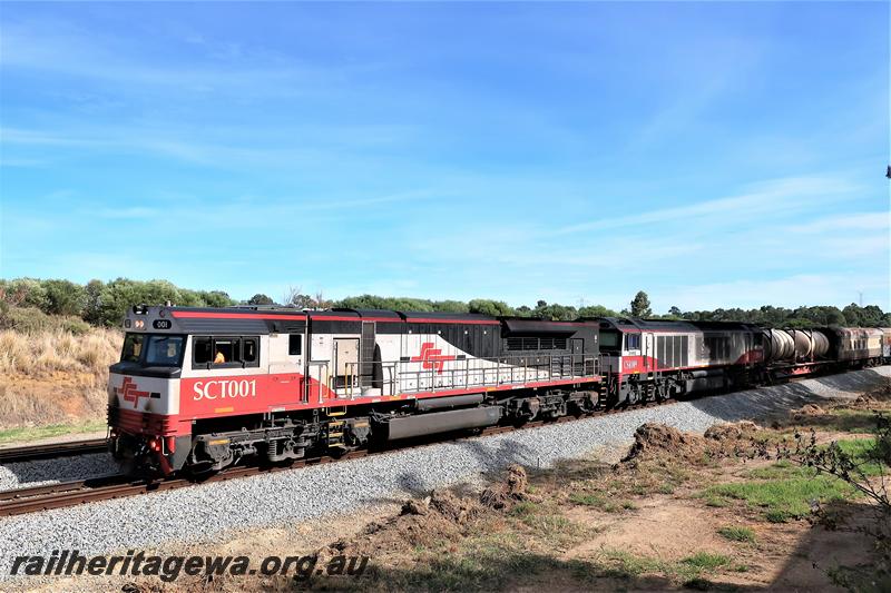 P21003
Specialised Container Traffic loco SCT class 001 double heading with CSR class 009 on a south bound SCT freight train passing through Hazelmere
