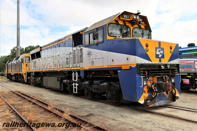 P21011
CFL loco VL class 361 in the yellow , blue and grey livery passing through the site of the Rail Transport Museum, Bassendean heading towards UGL's plant, front and side view.
