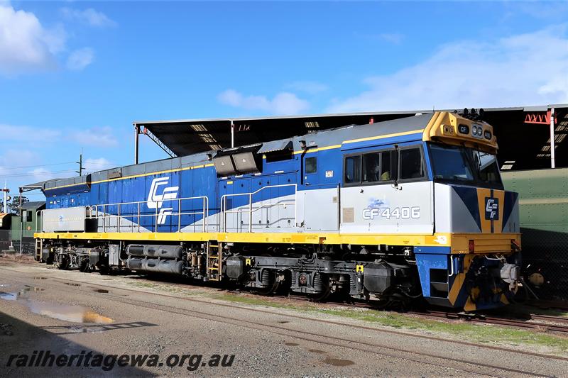 P21012
CFL loco CF class 4406 in the blue and grey livery with yellow stripe, waiting on the site of the Rail Transport Museum, side and front view.
