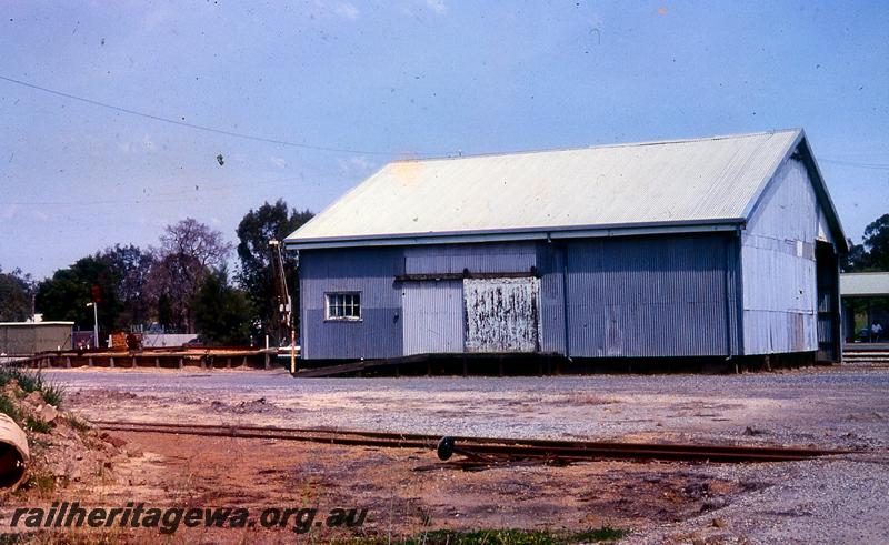 P21040
3 of 4 views of the 2nd Class goods shed at Pinjarra, SWR line, rear view including the loading platform and the platform crane
