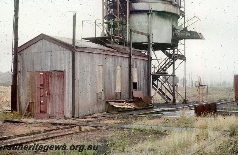 P21060
3 of 3 views of the cylindrical steel coal stage at Collie, BN line, view along the coaling line in the front of the stage.
