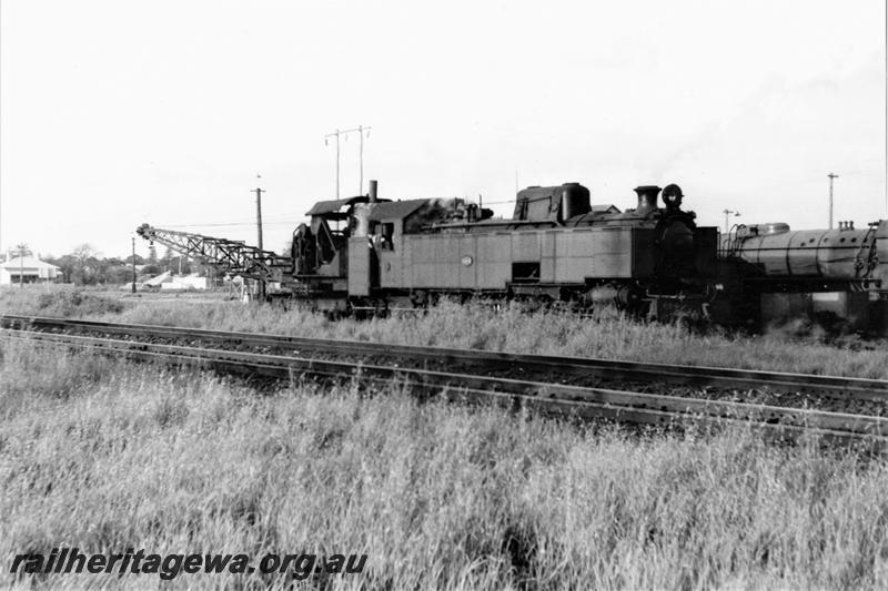 P21107
UT class 664, mobile crane, another steam loco, East Perth running sheds, ER line, side and front view
