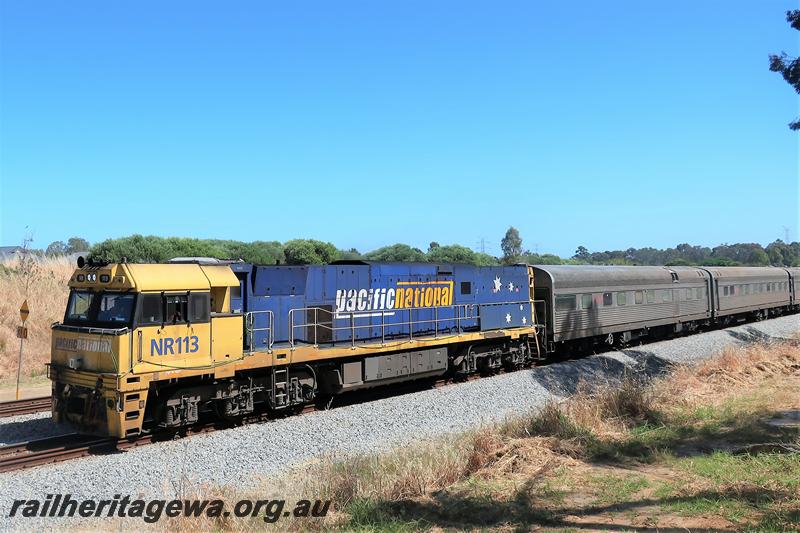 P21132
Pacific National NR class 113 in the blue and yellow livery  heading the AK Inspection Train southwards through Hazelmere
