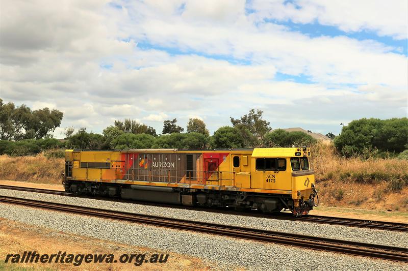 P21135
Aurizon ACN class 4175 in the yellow livery with red and grey panels,  light engine heading nothwards through Hazelmere
