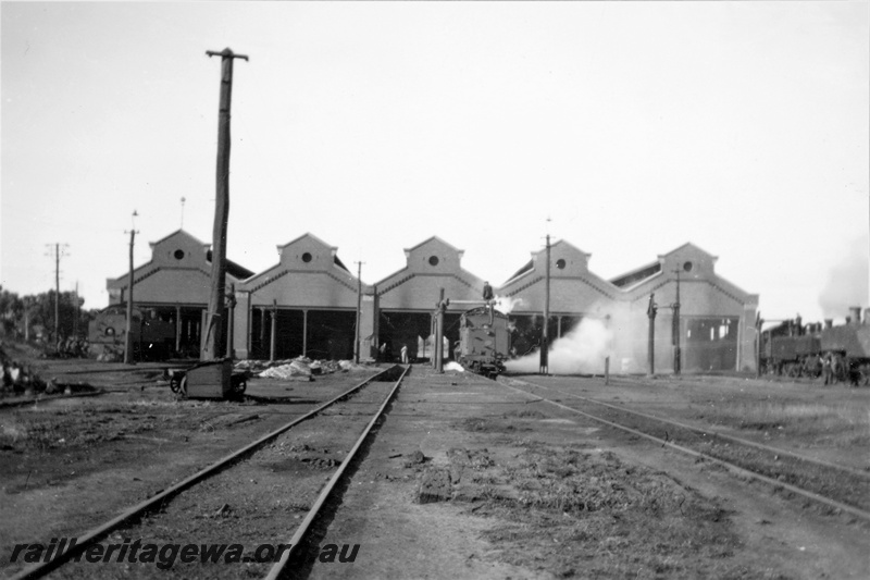 P21211
Loco sheds, loco taking on water, water column, East Perth, ER line
