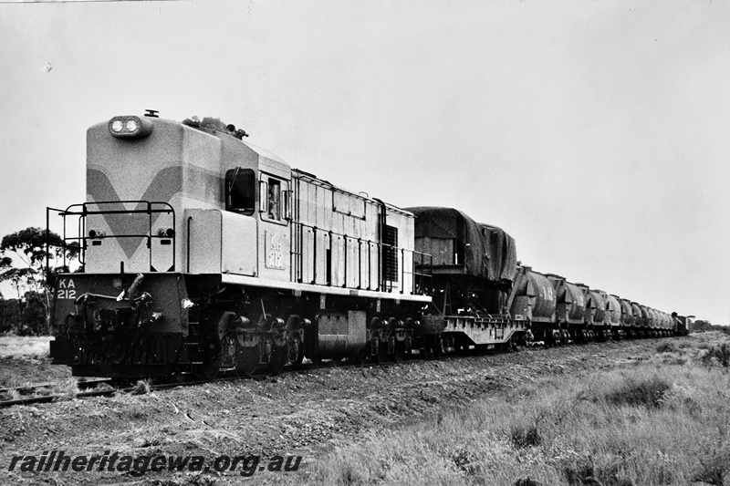 P21300
KA class 212, on freight train to Malcolm comprising mainly nickel wagons, near Comet Vale, KL line, front and side view
