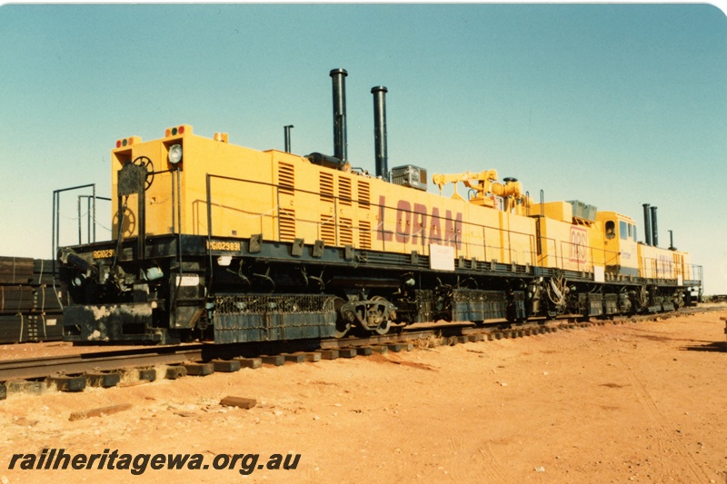 P21325
Loram Australian Rail Service rail grinder, three component units on tracks, Port Hedland, end and side view
