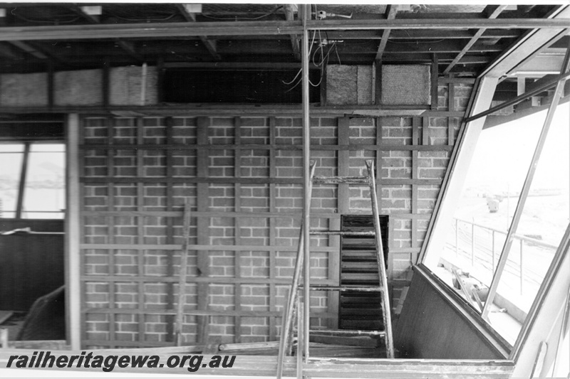 P21328
1 of 3 views of the construction of yardmaster's office and control Tower, at Leighton , internal view of the top floor, showing a dividing brick wall.
