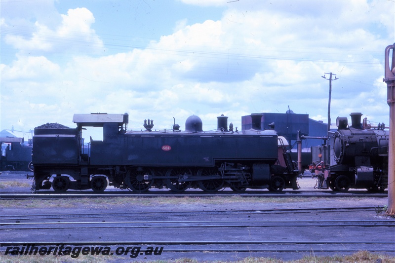 P21338
DM class 581, water tank, water column, tracks, side view
