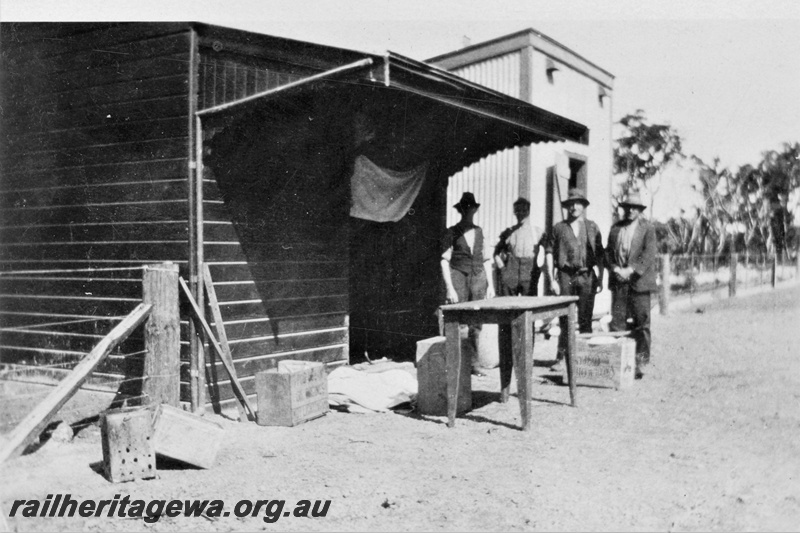 P21366
Construction of siding buildings, workers, bush setting, c1930s
