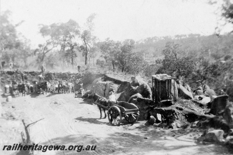 P21369
Gravel quarry, horse drawn cart and driver, other horse drawn carts and drivers, workers, Parkerville, Eastern Railway duplication, ER line, c1932-1934
