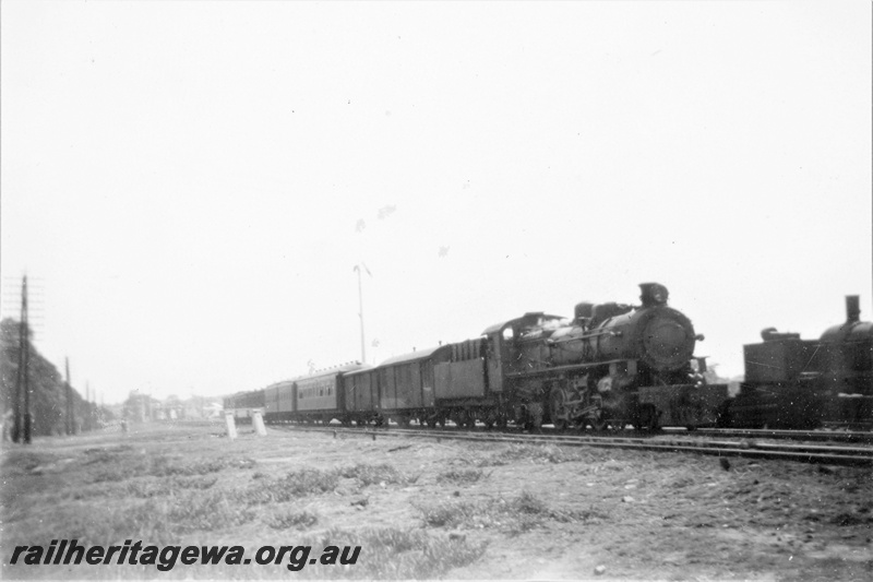 P21390
PMR class 723 on passenger train, MSA class loco (part), siding and buffer, side and front view 
