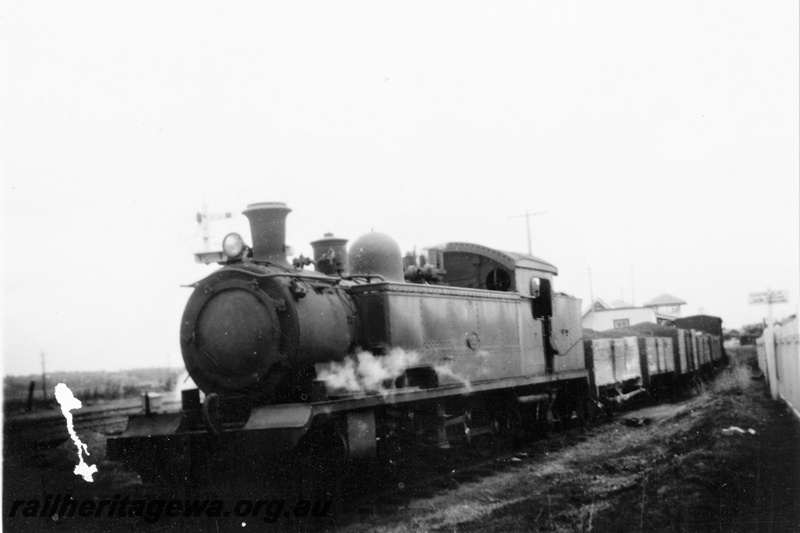 P21392
DS class 371 on goods train, station buildings, Midland Junction, ER line, front and side view
