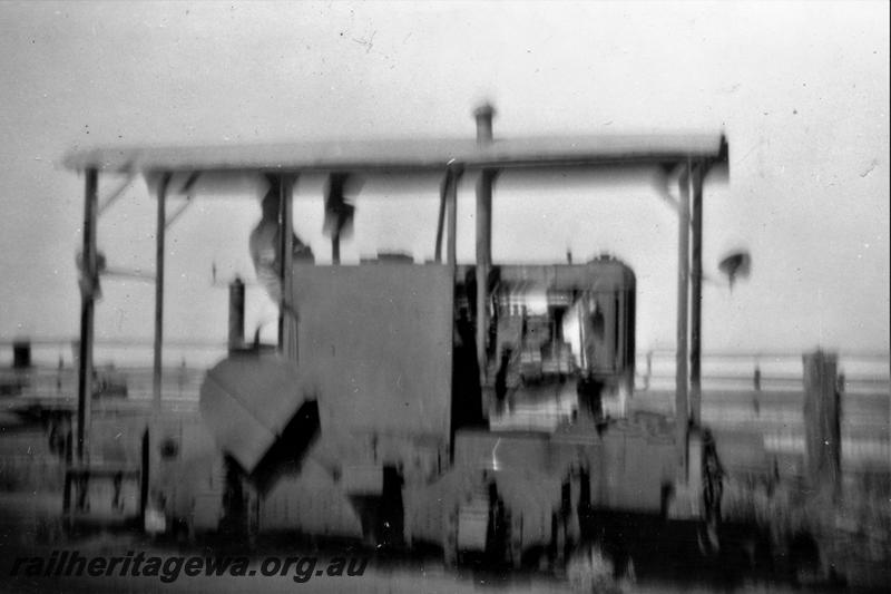P21424
Shunting tractor, with driver Mr Jackie Trent, Port Hedland, PM line, side view
