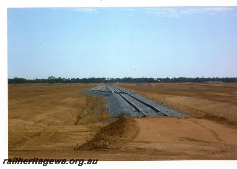 P21449
Newly constructed spur, for load out of iron ore from Mount Gibson mine, points, rural countryside, 2 kms south of Perenjori, EM line, track level view
