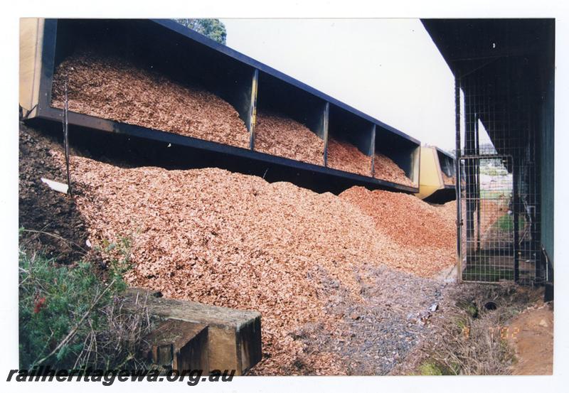 P21469
Woodchip wagons on side, woodchips spilled out, Bridgetown, PP line, ground level view
