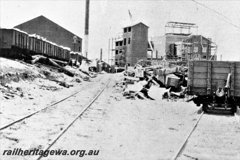 P21488
1 of 3 views of the Colonial Sugar Refineries plant at the end of the Rocky Bay line in Mosman Park, plant  under construction, shows railway lines through the site and wagons on the lines, c1929
