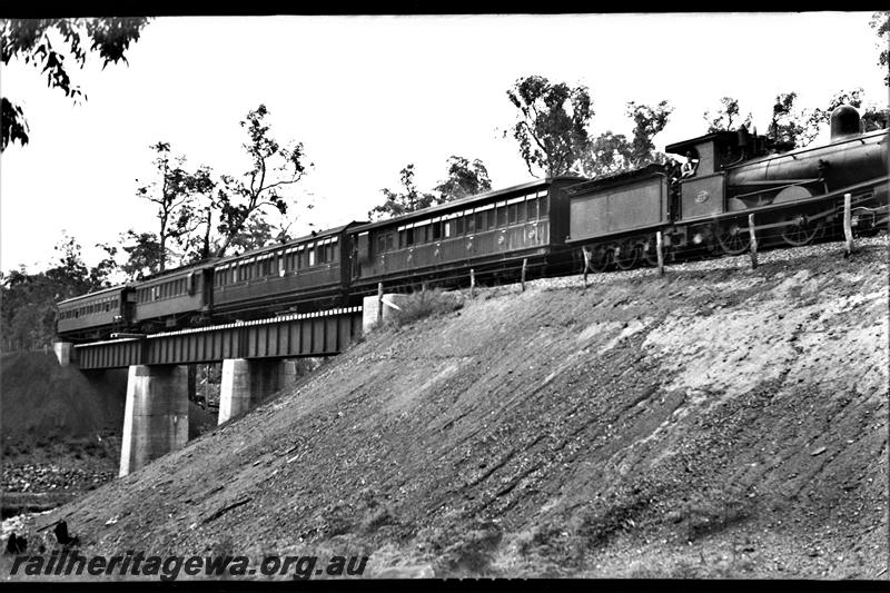 P21521
T class 11 on inspection train, crossing concrete and steel bridge, PP line, side view from bottom of embankment
