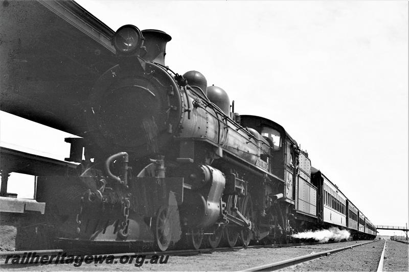 P21523
PR class loco, on passenger train, platform, canopy, overhead bridge, tracks, Kalgoorlie station, EGR line, front and side view
