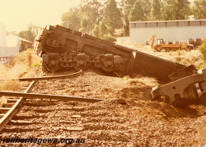 P21526
2 of 5 derailment of D class 1564, loco lying across track bed, tracks twisted, truck, excavator, Bridgetown, PP line, trackside view
