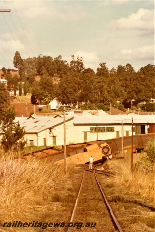 P21528
loco lying across track, buildings, onlooker, Bridgetown, PP line, view along tracks
