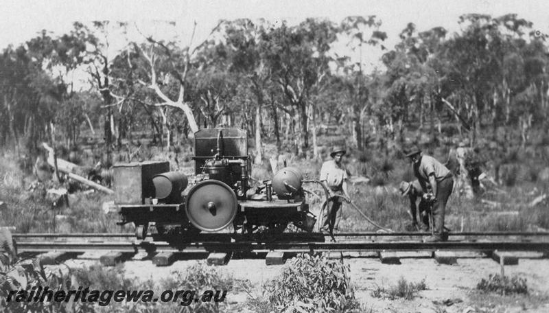 P21544
5 of 20 Construction Scenes of Third Beechina Deviation between Wooroloo and Chidlow ER line c1920s, boring sleepers, workers, boring machinery
