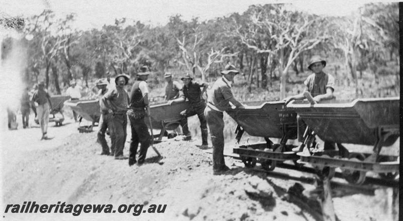 P21556
17 of 20 Construction Scenes of Third Beechina Deviation between Wooroloo and Chidlow ER line c1920s, loading mining wagons with earth, workers, Allans Cutting
