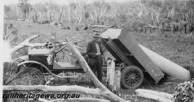 P21557
18 of 20 Construction Scenes of Third Beechina Deviation between Wooroloo and Chidlow ER line c1920s, truck unloading, driver, branches, culvert
