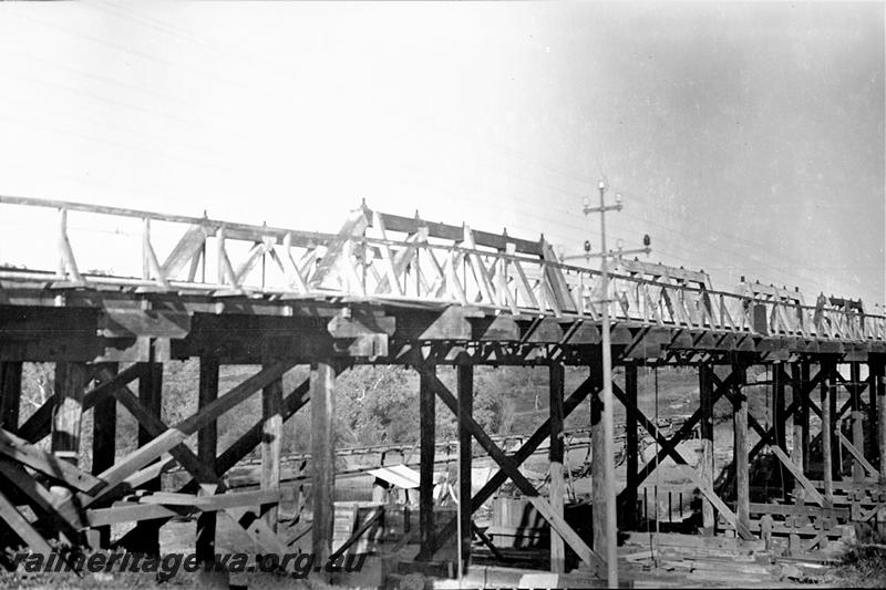 P21569
Wooden bridge over Greenough River, Eradu, NR line, view from river bank
