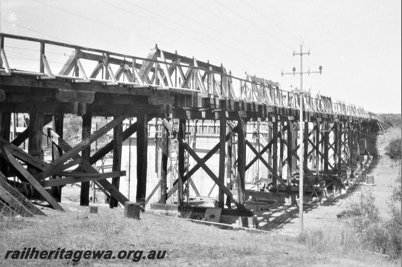 P21575
Wooden bridge over Greenough River, Eradu, NR line, view from river bank
