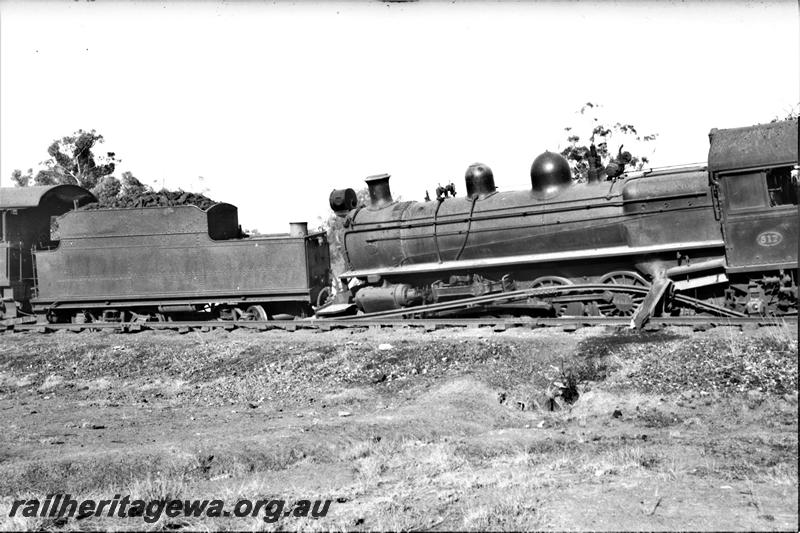 P21593
P class 517 loco and tender of  P class 510 loco, both derailed, bent track, Popanyinning, GSR line, side view from track level. Date of derailment 8/2/1953
