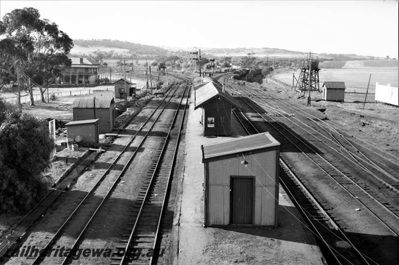 P21605
Station, platform, station buildings, trackside buildings, hotel, bracket signals, water tower, points, sidings, yard, Spencers Brook, GSR line, view from an elevated position looking along the platform
