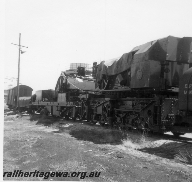 P21811
Cowans Sheldon 60 ton breakdown crane No. 31, in a consist looking along  the side of the crane, at Midland. ER line.
