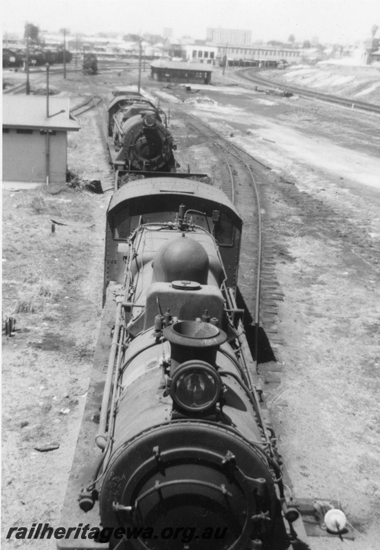 P21872
PMR class 726, V class loco, trackside buildings, points, sidings, loco depot at East Perth, ER line, view from an elevated position down onto the top and front of the locos
