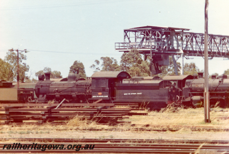 P21894
FS class 460, marked for preservation, another steam loco, on scrap road, loco depot, Midland, ER line, side and rear view 
