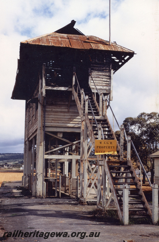 P21914
Signal box, gutted by fire, platform, Northam, ER line, view from bottom of stairs
