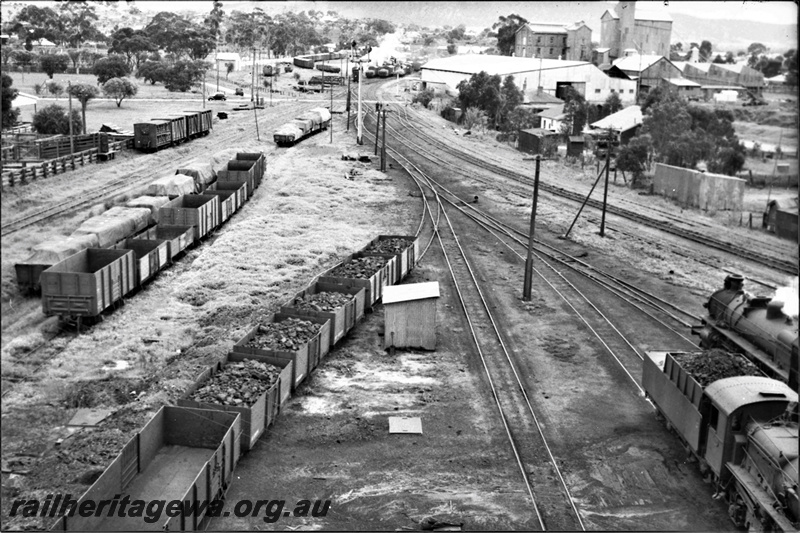 P21928
Steam locos, rakes of wagons, sidings, signal, town buildings, York, GSR line, elevated view from loco depot
