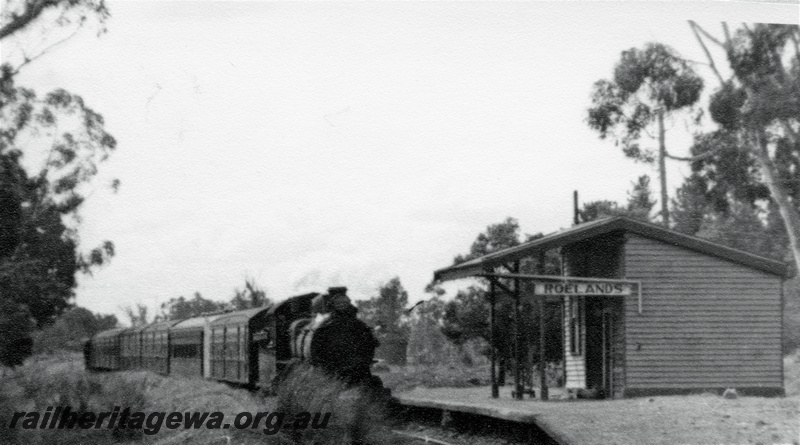 P22010
Steam loco on passenger train, platform, station building, Roelands, SWR line, view from track level
