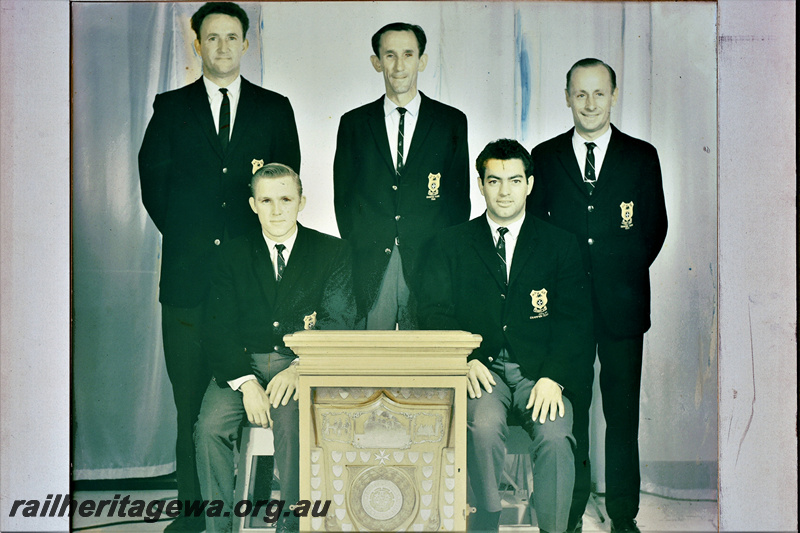 P22033
Group photo, Winning Railway Champion First Aid Team 1965. Front row: M.J.Warnock, J. Di Masi. Back row: K.B. Warnock, W. Hartley, C.A.Coote
