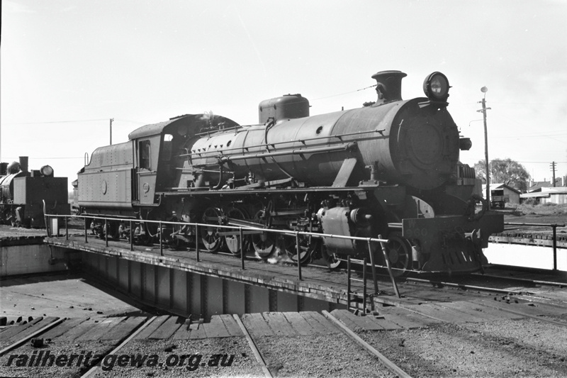 P22049
W Class 860, on turntable, Bunbury, side and front view, SWR line
