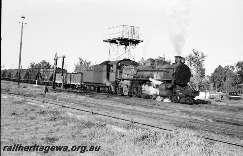 P22065
PMR class 729 departs Pinjarra for Perth. Water tank in background. SWR line.
