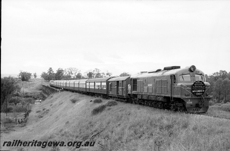 P22081
X class 1006 hauling ARHS Mogumber tour train crossing wooden trestle bridge over Swan River, Upper Swan. 
