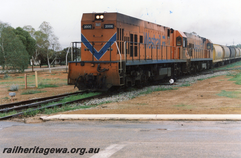 P22187
P class 2006, and another P class loco, double heading wheat train, siding, point lever, road crossing, Wyalkatchem, GM line, front and side view
