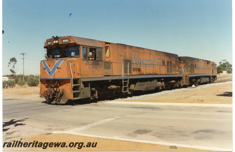 P22188
P class 2003 and P class 2008, road crossing, point lever, Wyalkatchem, GM line, end and side view, c1999
